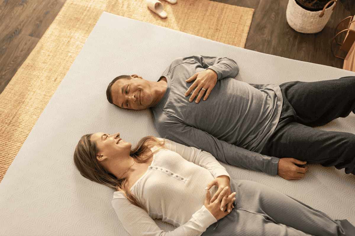 A couple laying on the TEMPUR-Cloud 3 inch topper